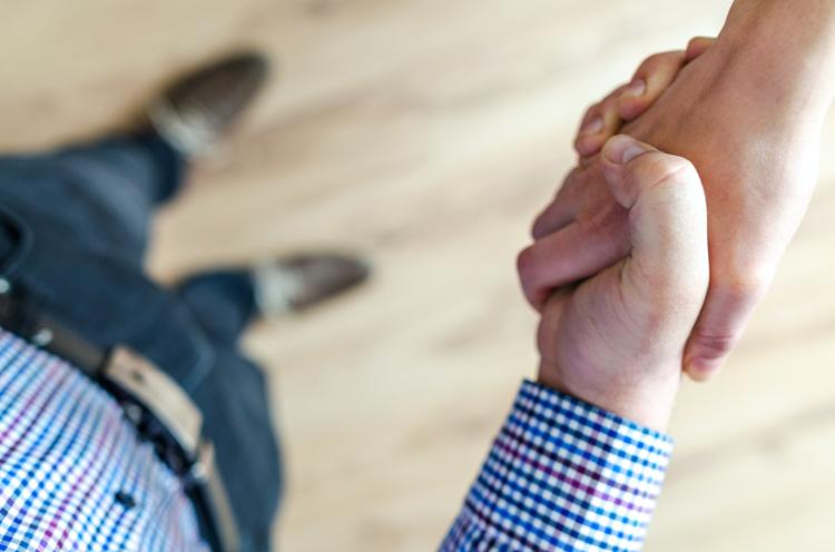 Handshake after an agreement